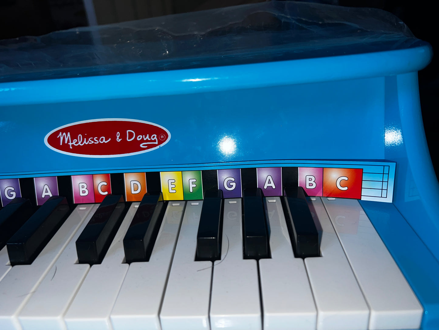 Melissa and Doug piano - sticker is peeling